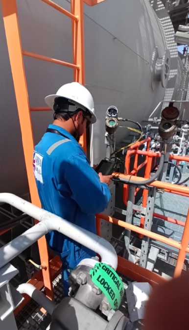 Workers connecting instrumentation cables