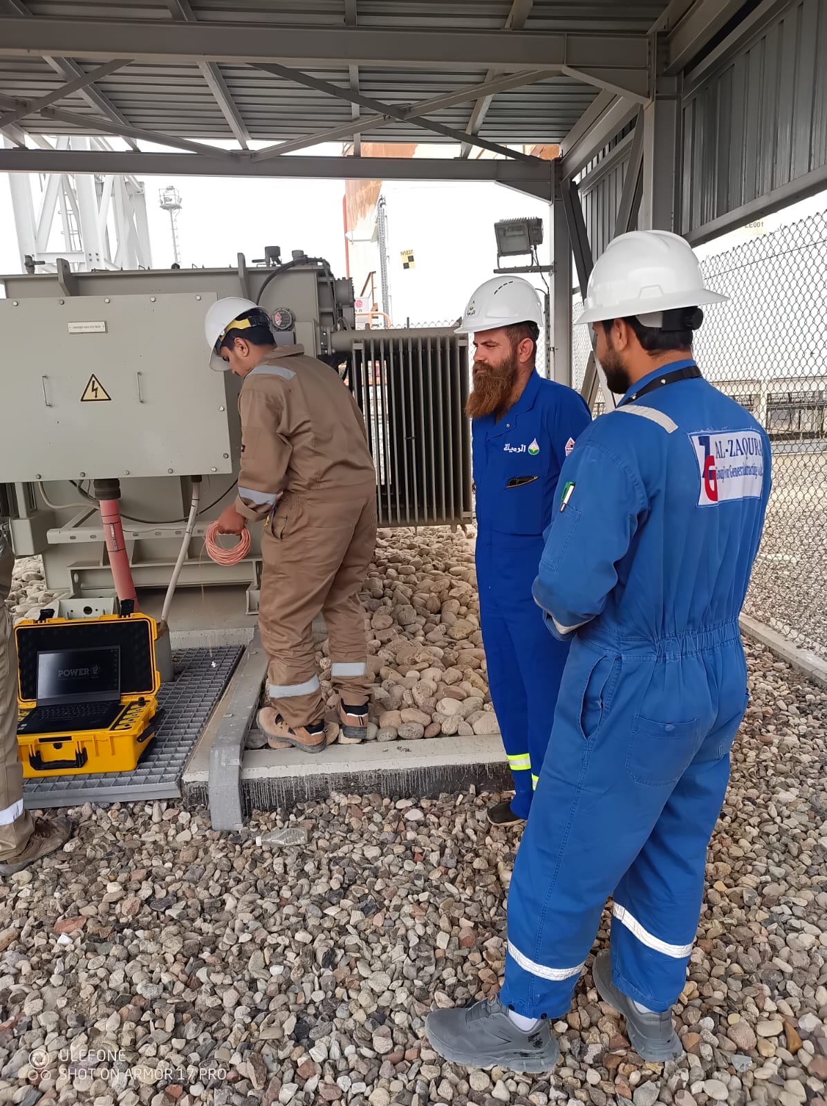 Engineers installing cable tray